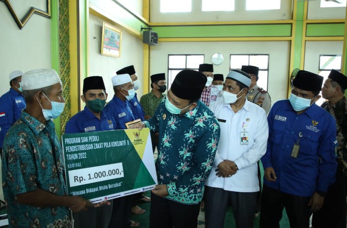 Husni Merza Ajak Masyarakat Suka Bersedekah