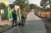 Menjaga Napas Jalan Baru: Dedikasi Satgas TMMD 129 Bojonegoro Merawat Impian Warga Kesongo
