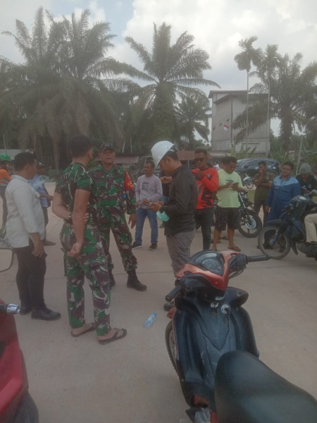 Sertu Afnal Laksanakan Giat Pengamanan Unjuk Rasa