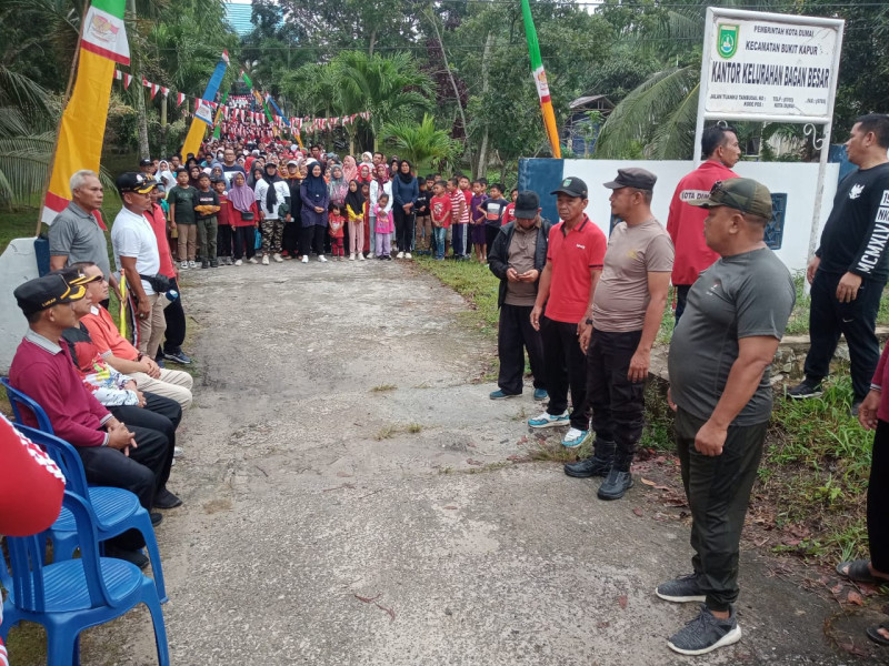 Sertu Sareh Koramil 02/BK Ikuti Jalan Santai HUT RI ke-79 di Kelurahan Bagan Besar