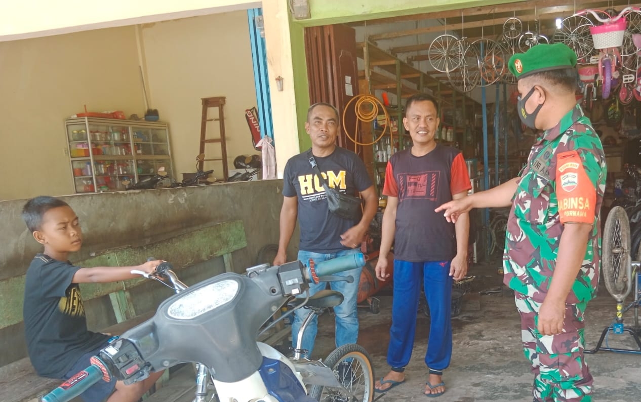 Sertu Mahyudin Minta Masyarakat Terus Mewaspadai Virus Covid-19