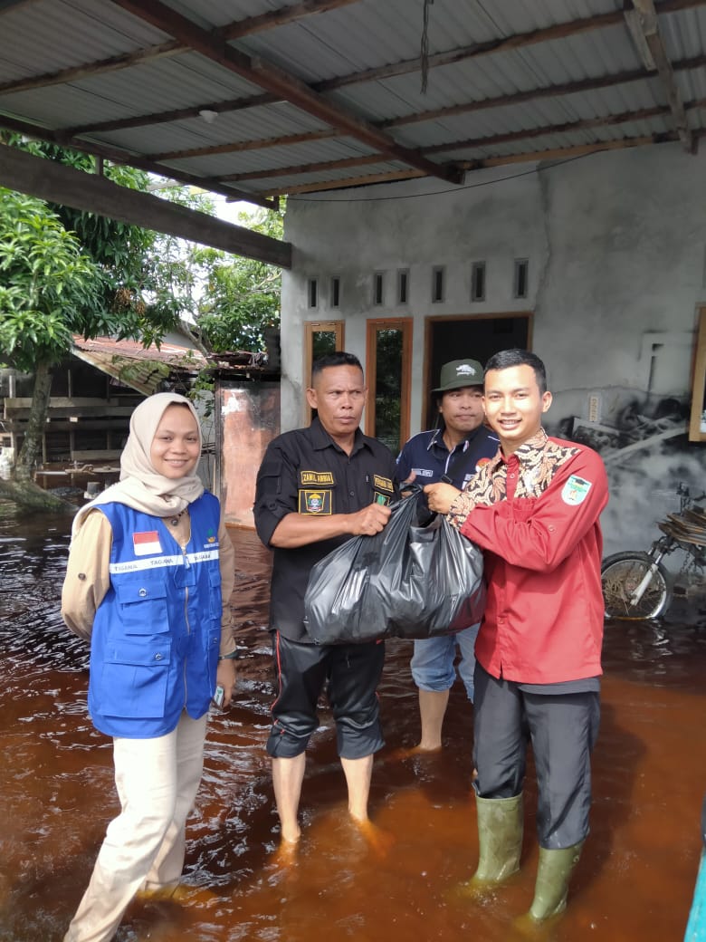 Aksi Tanggap Bencana Banjir oleh IMKD Pekanbaru Bersama TAGANA Kota Dumai.